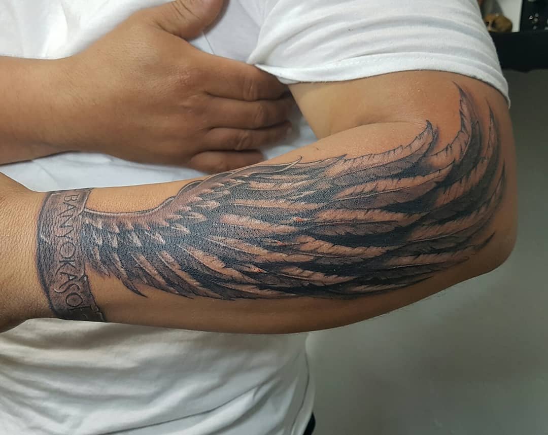 татуировка крыльев птицы