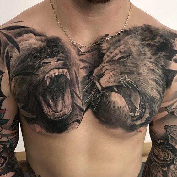 татуировка рычащих животных на груди
